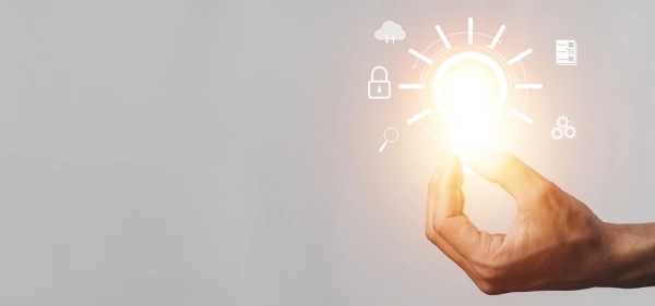 Hand holding light with emojies